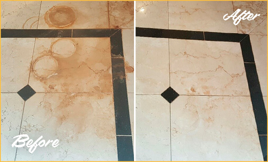 Before and After Picture of a Westfield Hard Surface Restoration Service on a Marble Floor to Eliminate Rust Stains